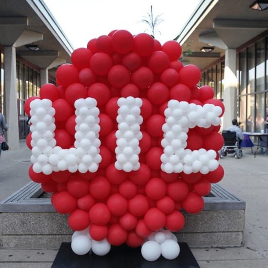 UIC logo with ballons